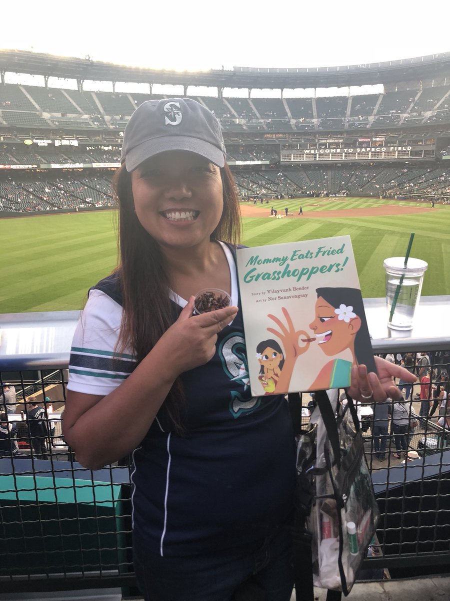 KBounkeua's tweet photo. #MyMommyEatsGrasshoppers Children’s book at Seattle Mariners game @SahtuPress @Mariners #GoMariners @whereiroot #Laoauthor #Childrensbook #momdaughterstory #culturaldifferences #laopride #womanwriter #womansupportingwoman https://t.co/FphlDi8mMZ