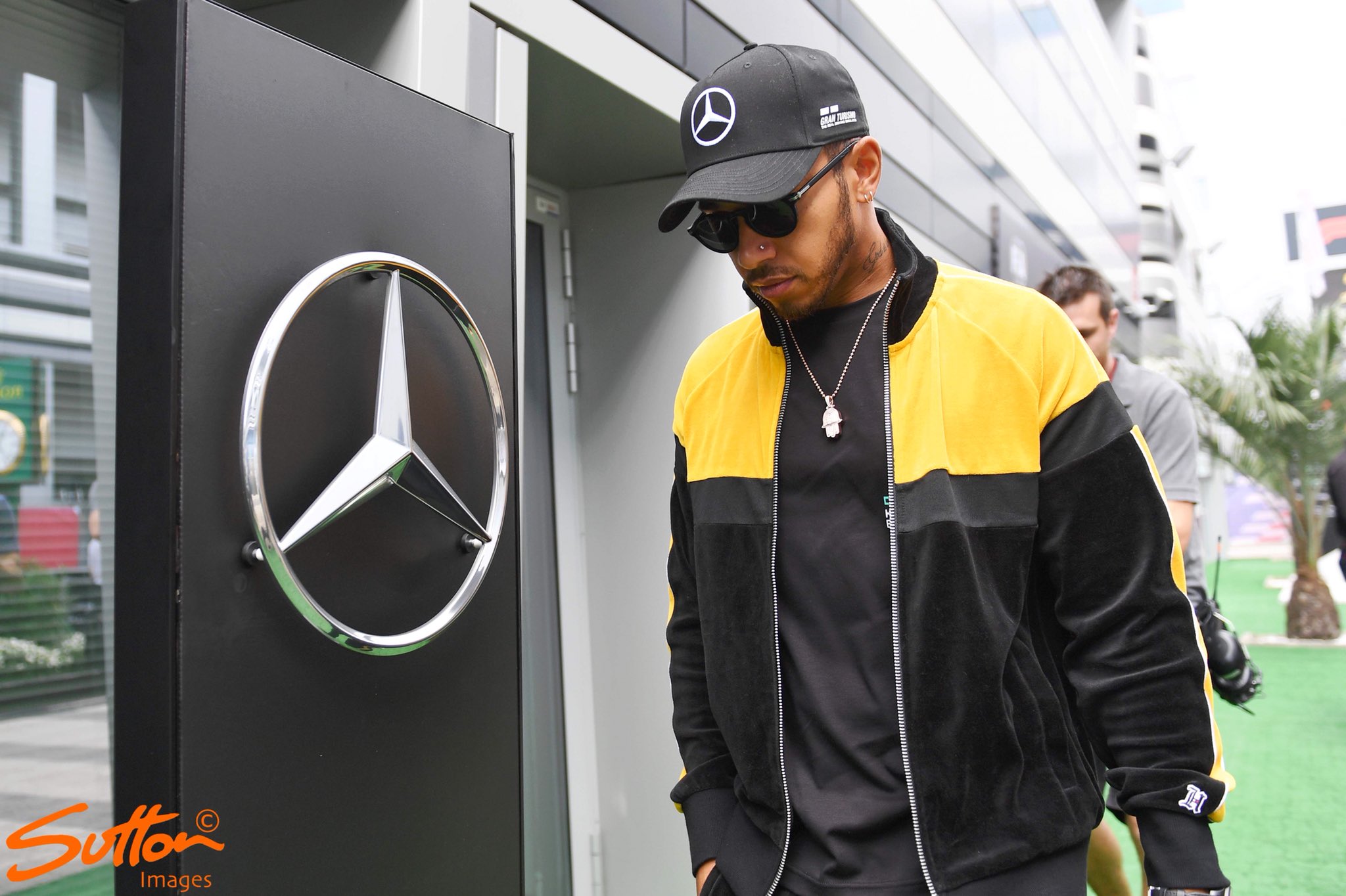 Lewis Hamilton dons a £3,800 Louis Vuitton tailored tracksuit at