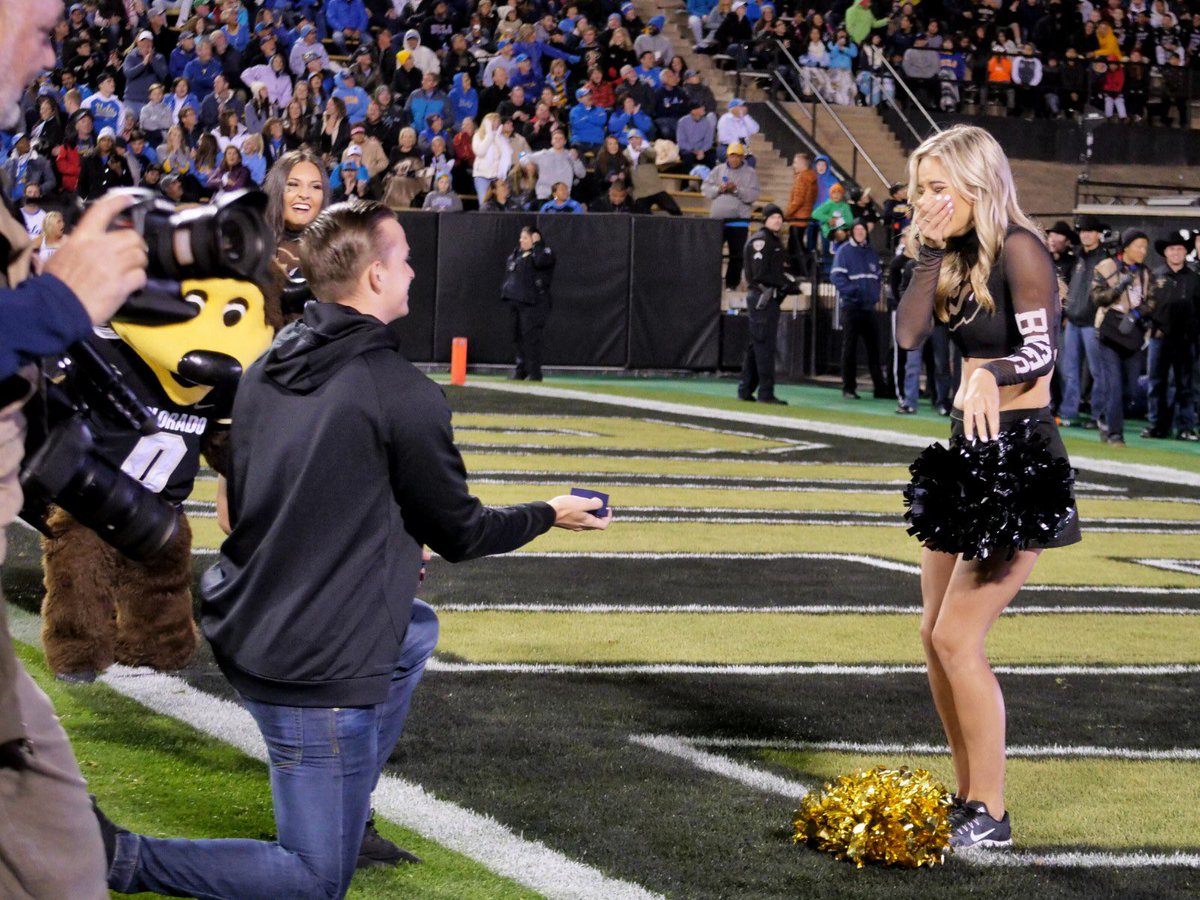 CUBoulder's tweet photo. When your night is made 💛🖤Congratulations, Courtney and Huntor! 

📷: Glenn Asakawa https://t.co/I3BAw1cuuB