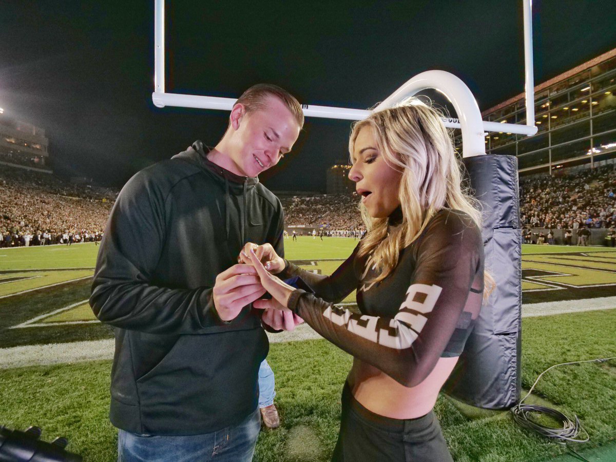 CUBoulder's tweet photo. When your night is made 💛🖤Congratulations, Courtney and Huntor! 

📷: Glenn Asakawa https://t.co/I3BAw1cuuB