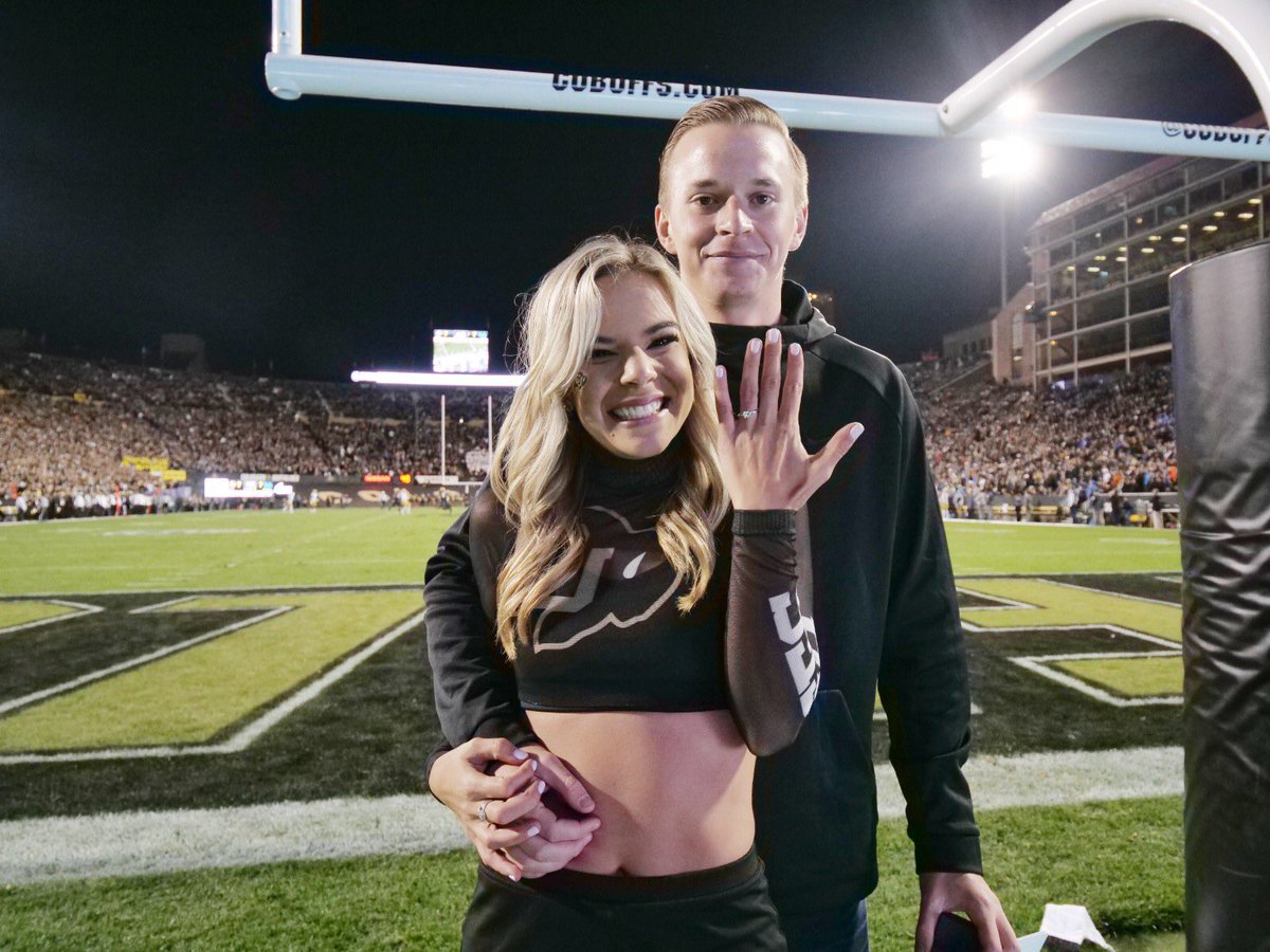 CUBoulder's tweet photo. When your night is made 💛🖤Congratulations, Courtney and Huntor! 

📷: Glenn Asakawa https://t.co/I3BAw1cuuB