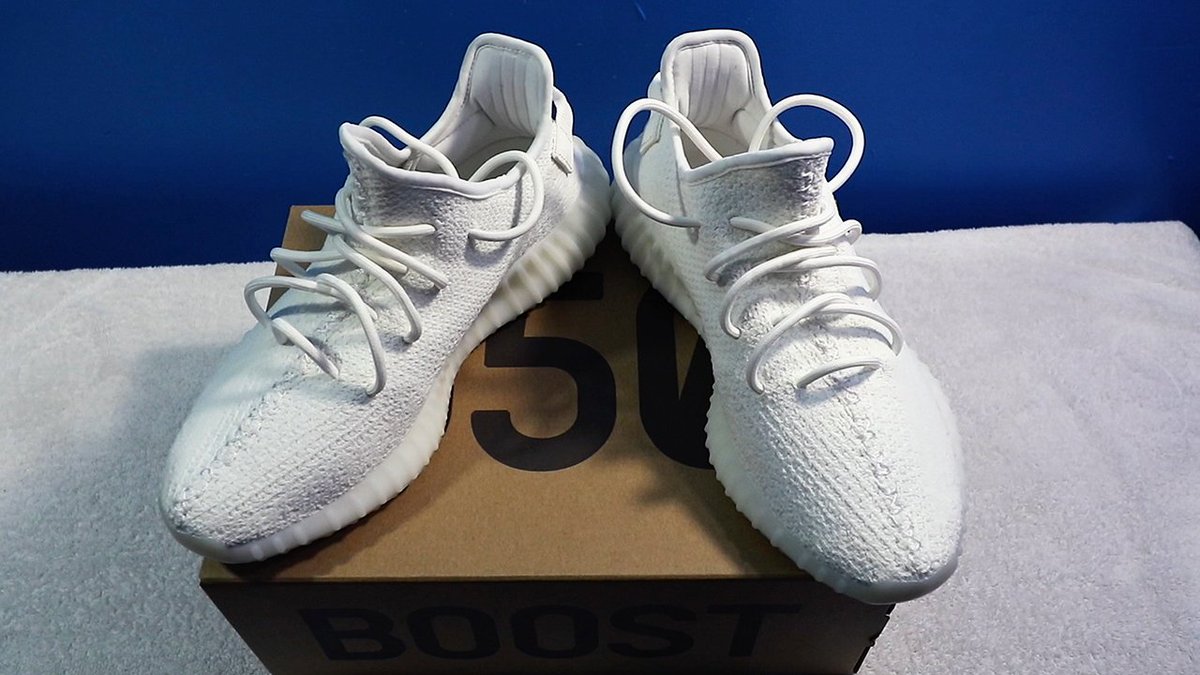 triple white yeezy on feet