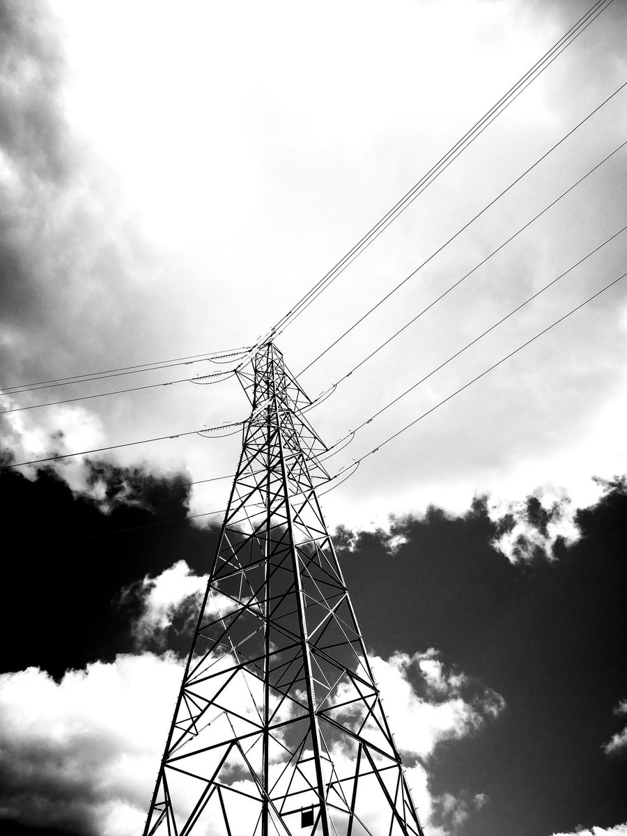 DPhotographic's tweet photo. The symmetry of electrical pylons makes them really awesome to photograph #pylon #blackandwhitechallenge #sky #Abstract #abstractphotography https://t.co/KivD4zs6mi