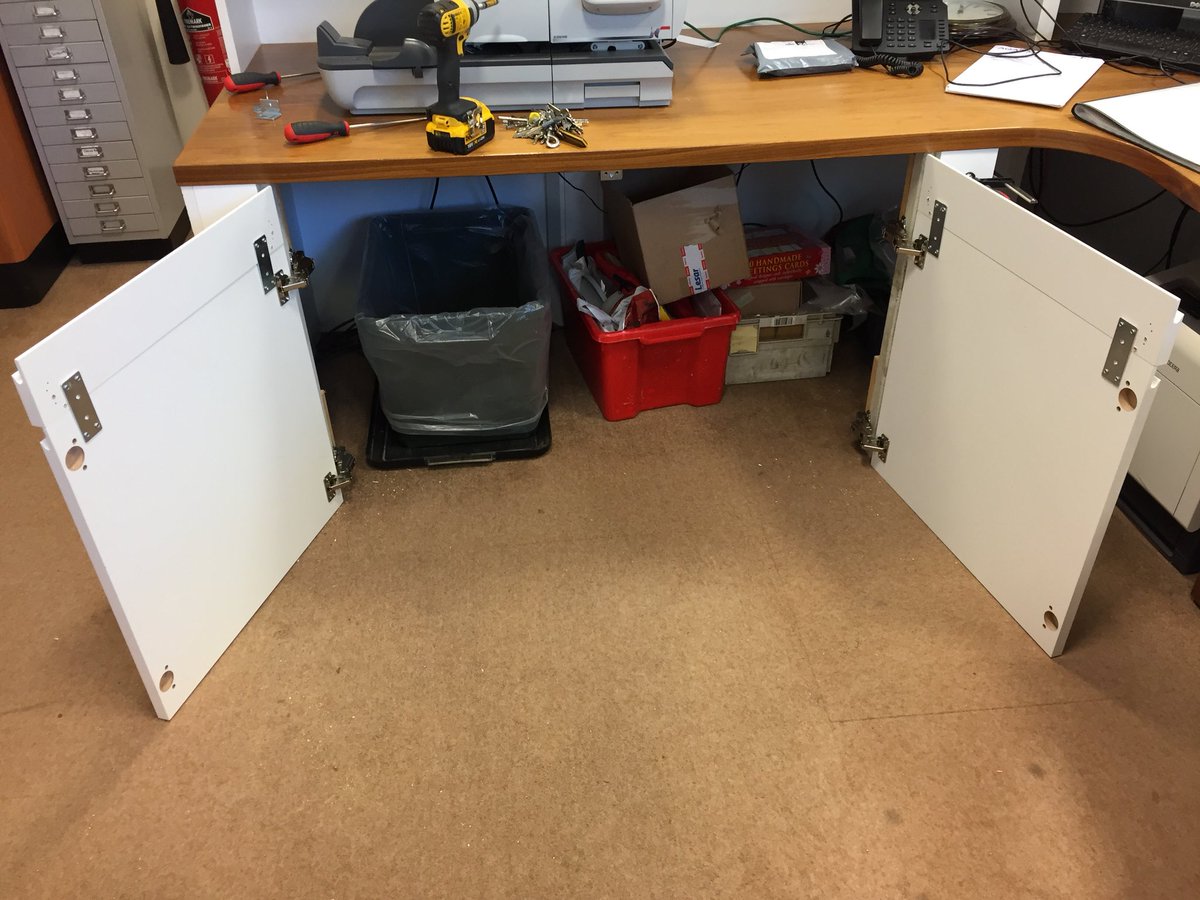 RiddlesdownColl's tweet photo. One of the tasks today was to build a cupboard to hide the boxes under the desk in reception. Mostly finished now. https://t.co/8YEL9IphGu