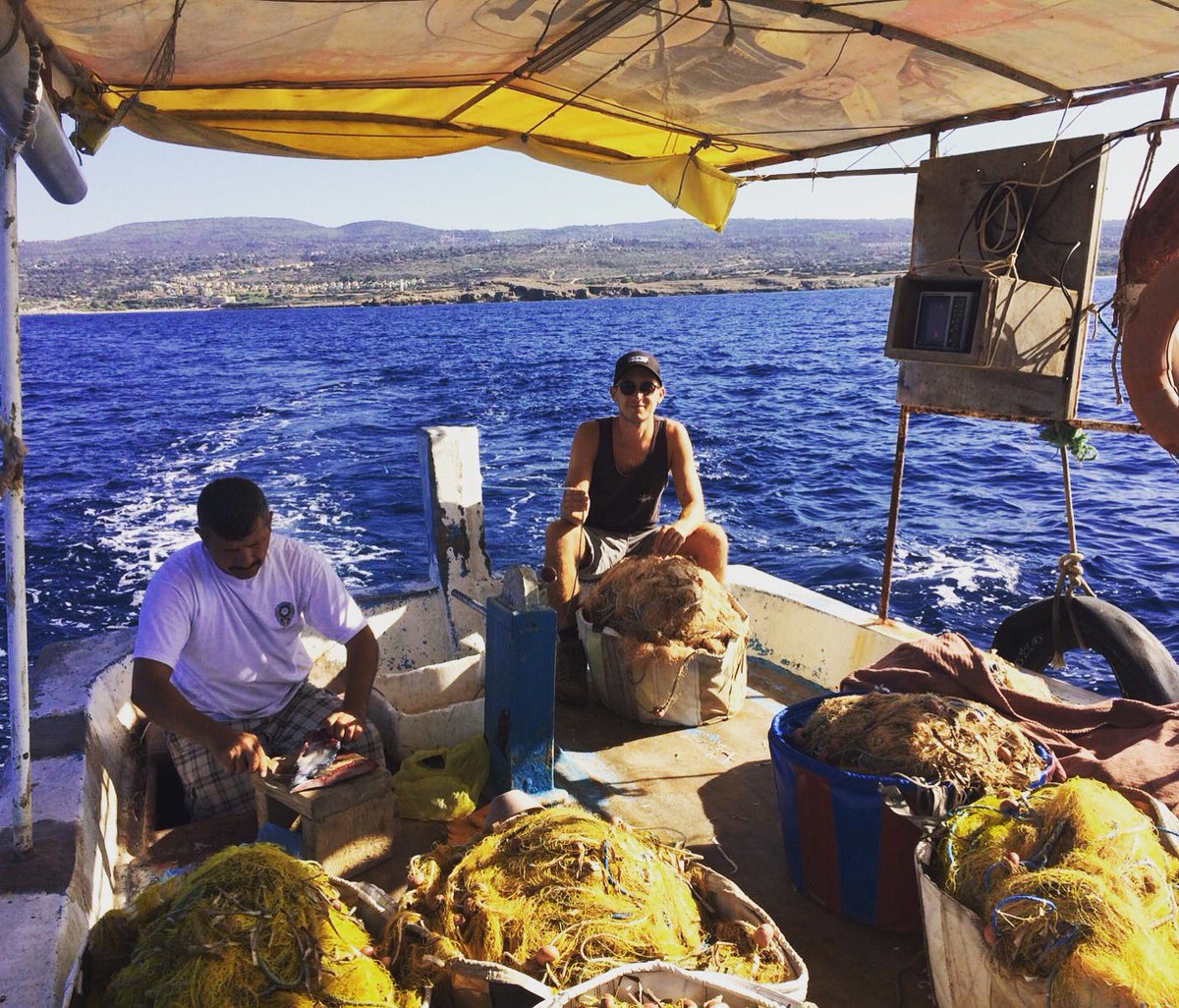 AlexScottMsc's tweet photo. Holding the line for Mustafa the fisherman to feel less useless on the boat. Caught nothing mind. #SPOT #bycatch #Cyprus https://t.co/0XWGrsizAW