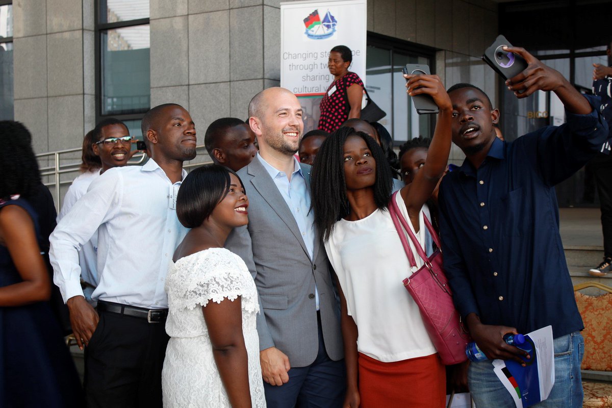 MalawiScotland's tweet photo. Minister @BenMacpherson stopped for a few selfies with the youth on his way out, because what's a meeting with the youth without a selfie? #HighLevelConference @ScotlandMalawi @ScotGovID @MamieMartinFund @AM_Scotland @MissKazuwa https://t.co/TJbg6TQuy4