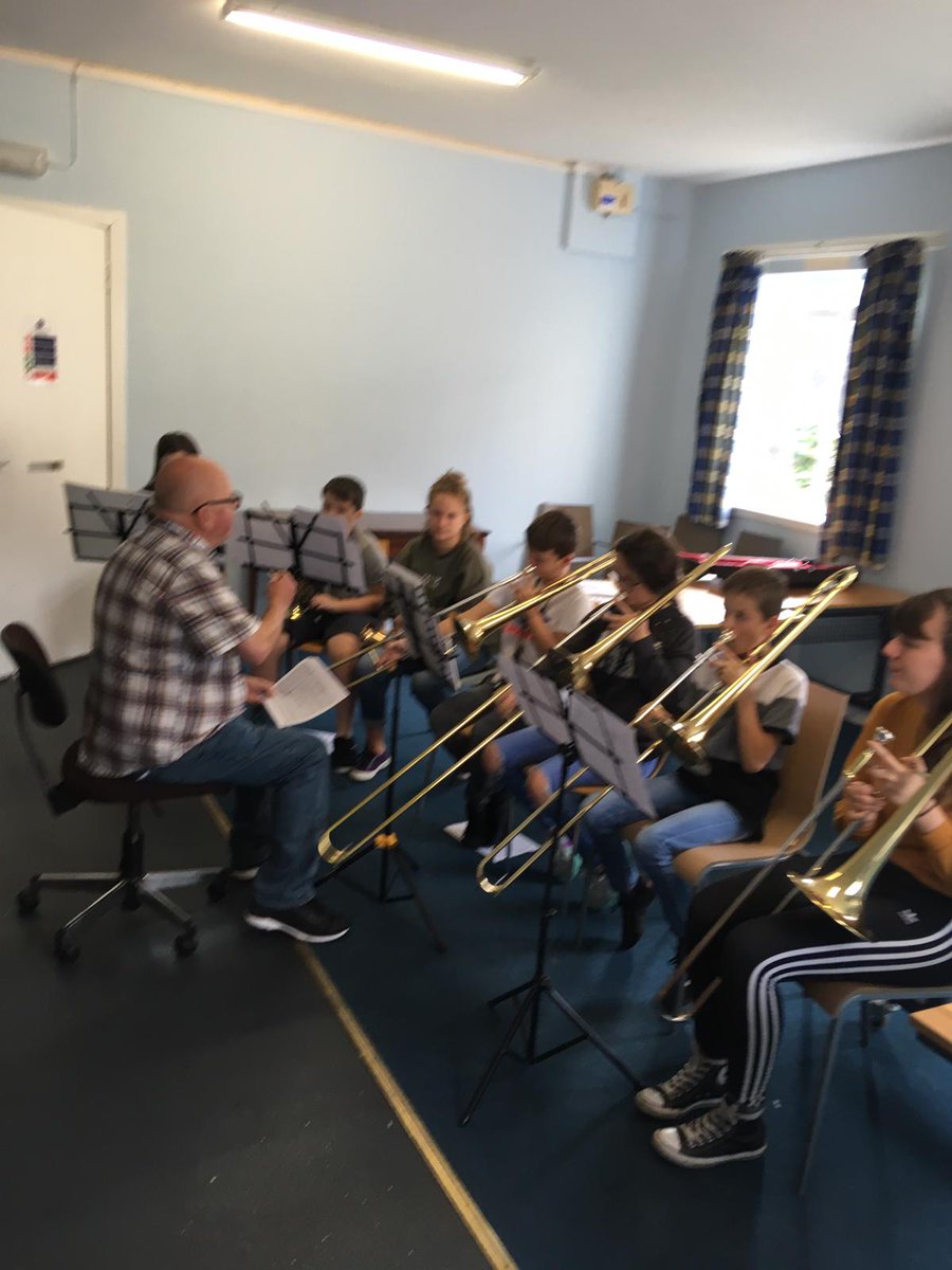 levernvalley's tweet photo. Mr Deans working with our beginners and some of our more experienced players during sectionals this morning.  We love welcoming back ex pupils to share their knowledge and expertise with our younger musicians #dedication #brassband #family 🎵🎺🎵🎺🎵 https://t.co/e5DOUlHV0F