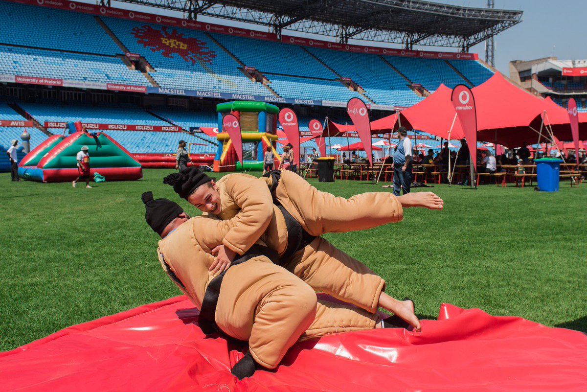 BlueBullsRugby's tweet photo. Want to be the ultimate carnival games champion? @Vodacom says #ChallengeAcccepted. You can’t be at Fortress Loftus and not feel that twinge of competitiveness. Young and old are trying their hand at the carnival games at the Vodacom #RedFamilyDay. Red. For those who expect more. https://t.co/zkMEDawglb