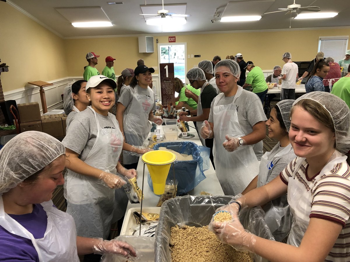 debbelangdon's tweet photo. How are you spending your Saturday morning? #CHSHOSA packing meals for Haiti!! @Clayton_Comets @coach_bjones #COMETSALLIN https://t.co/XVfbMmQcrU