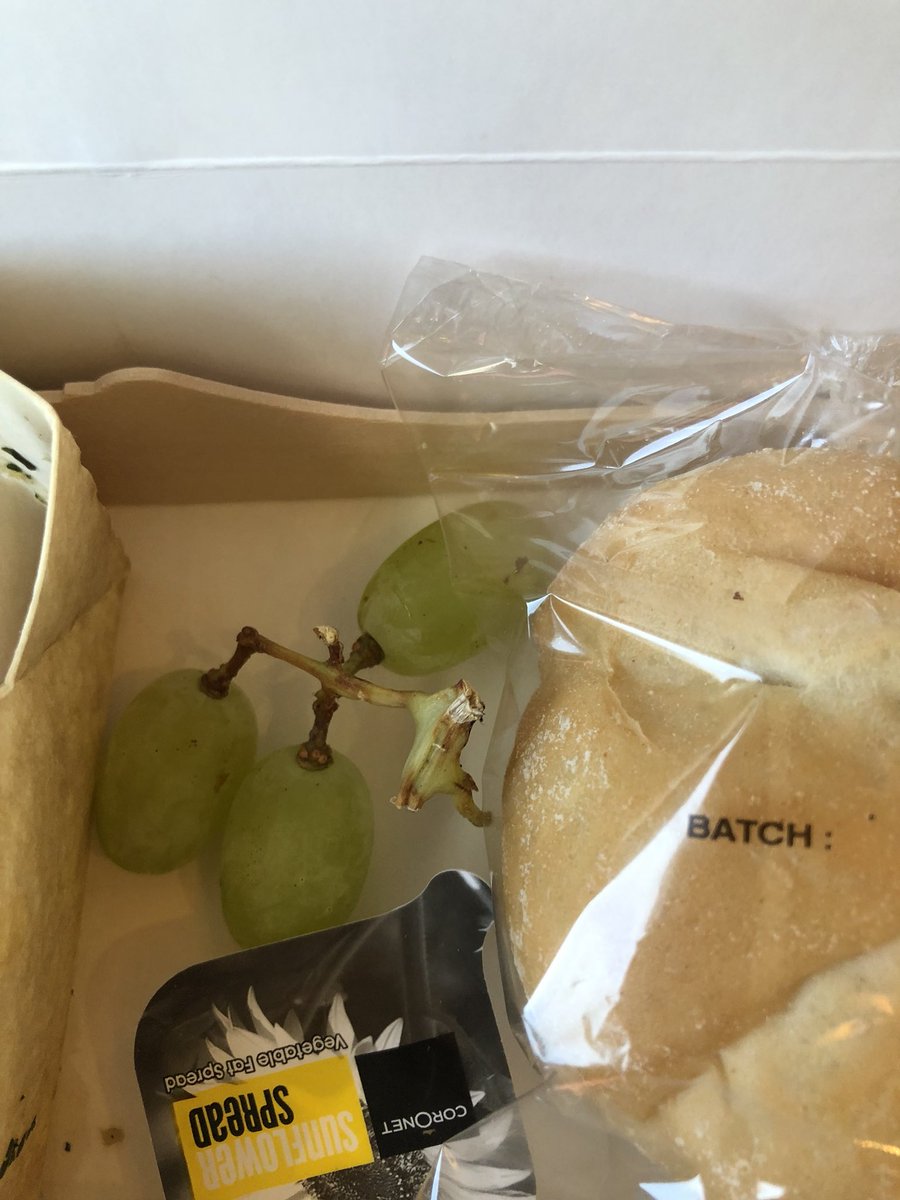 Whaleo79's tweet photo. @VirginTrains Are times that hard?  Limp salad. THREE, Grapes and bread ‘n’ butter. First class at its finest. https://t.co/1TDVPiVSax