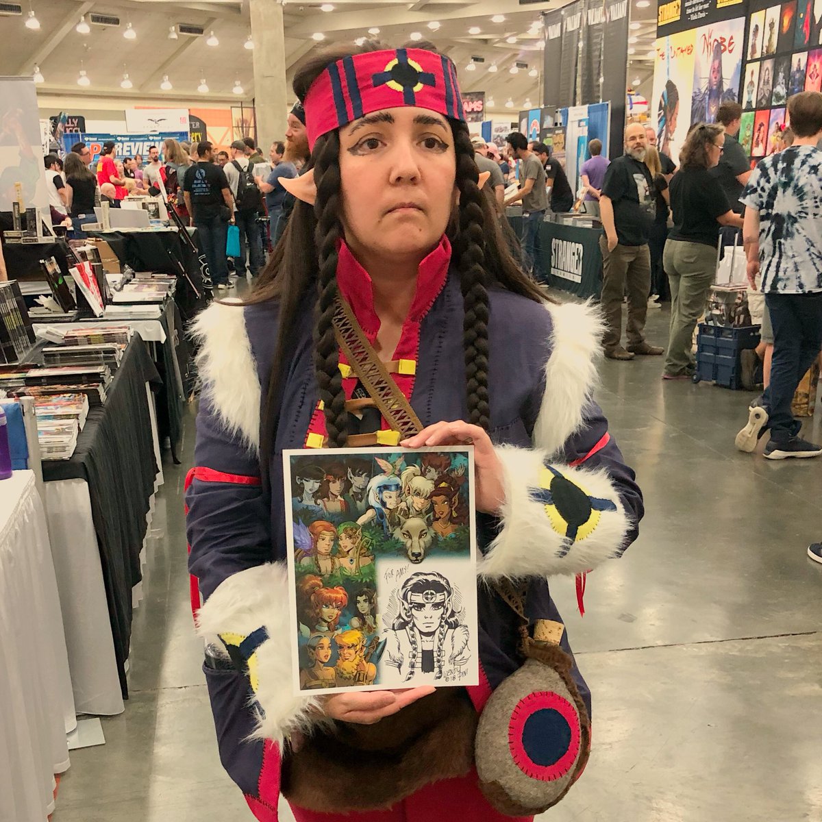 elfquest's tweet image. Art imitates life, or maybe it’s life imitating art. Either way we just loved the detail in this Dre-ahn #cosplay at @baltimorecomics by #Elfquest fan Amy Chappo, who is showing off her sketch of the mysterious silent elf introduced in Final Quest. #bcc2018