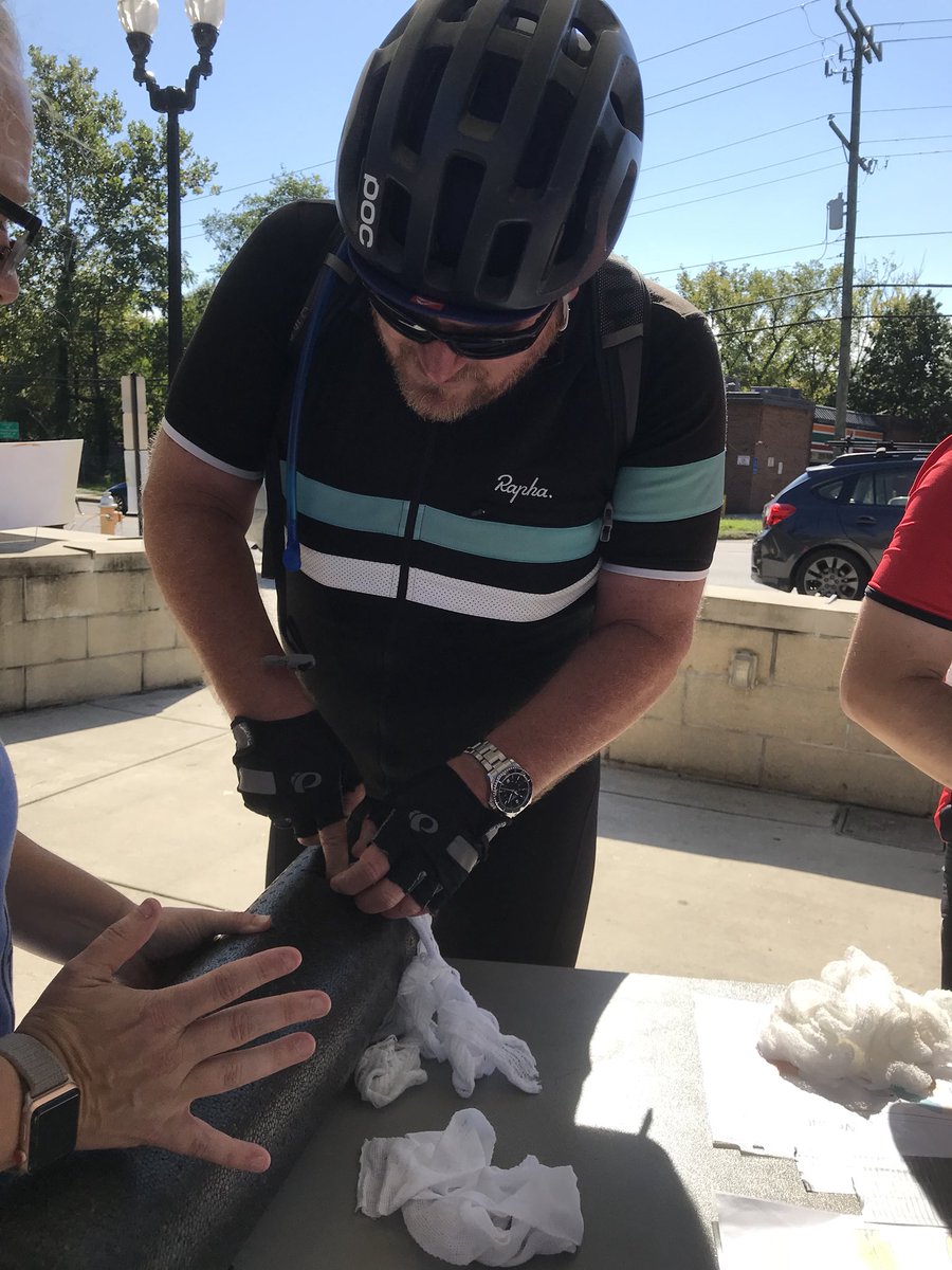 BikeArlington's tweet photo. @TSFRacing holding down the fort at the Arlington Mill Community Center where riders are learning to pack wounds and filling up their water bins. #DRTArlington #ARLPrep2018 #NATLPrep #ArlingtonBikes #dcbikes https://t.co/X4Hvu8Bv1t