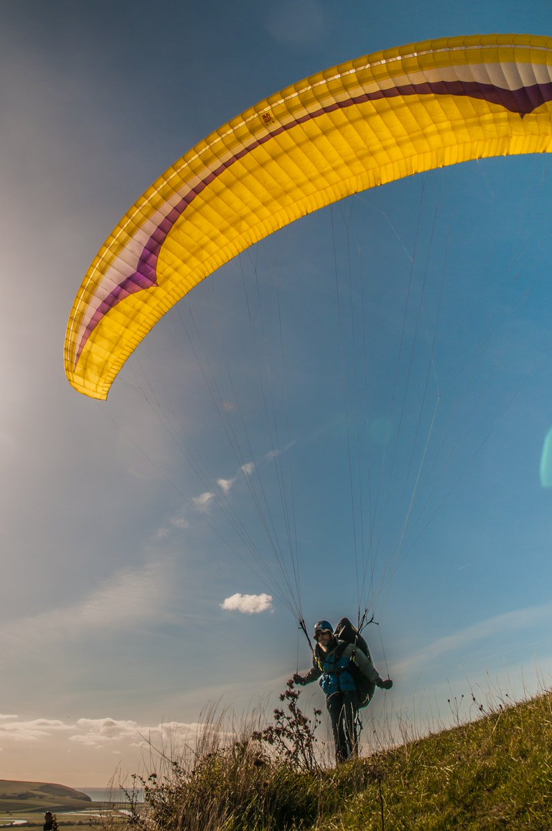 Bur1Burr's tweet photo. #Paragliders #Paragliding at #HighAndOver #Seaford #Litlington over the #Cuckmere River valley #Sussex UK . David Burr #Alamy live newsfeed https://t.co/C2beBlyMdT