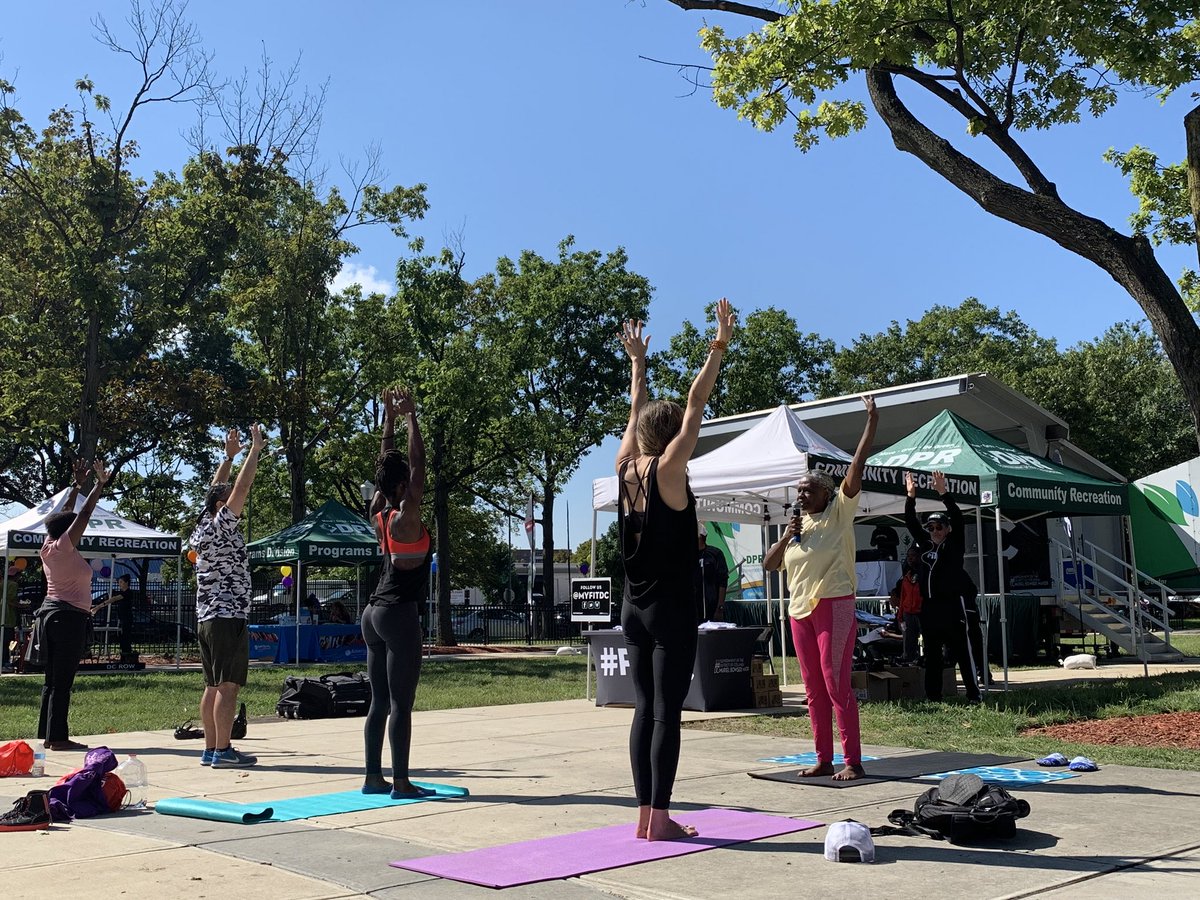 myFITDC's tweet photo. Namaste it’s 🧘♀️ time! #FITDC Zone at #DPRRecDay the first of many exercise classes and fitness competitions. #GetSomeDC #Yoga #FreeFitness https://t.co/qNoMLOEv5R