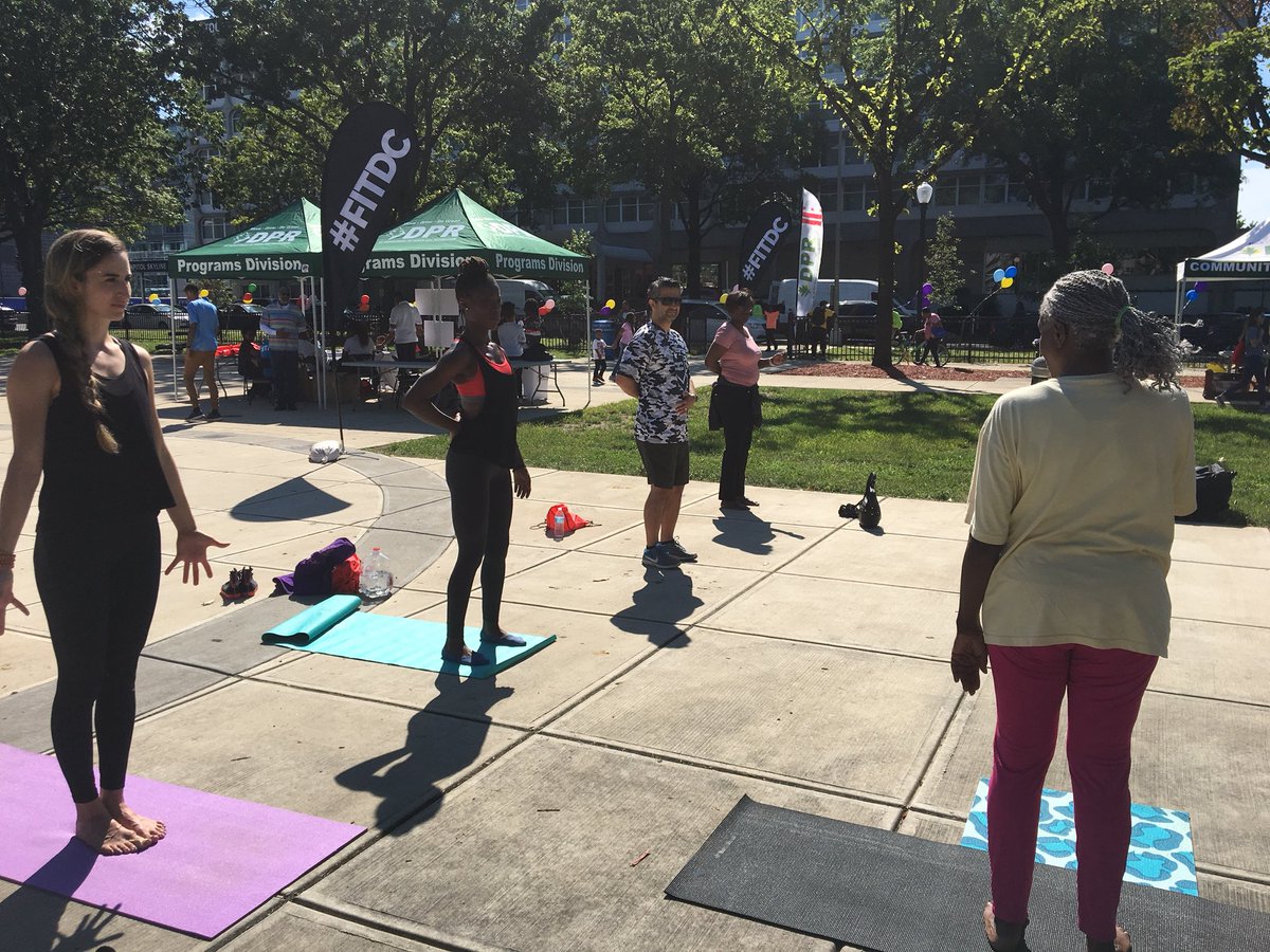myFITDC's tweet photo. Namaste it’s 🧘♀️ time! #FITDC Zone at #DPRRecDay the first of many exercise classes and fitness competitions. #GetSomeDC #Yoga #FreeFitness https://t.co/qNoMLOEv5R
