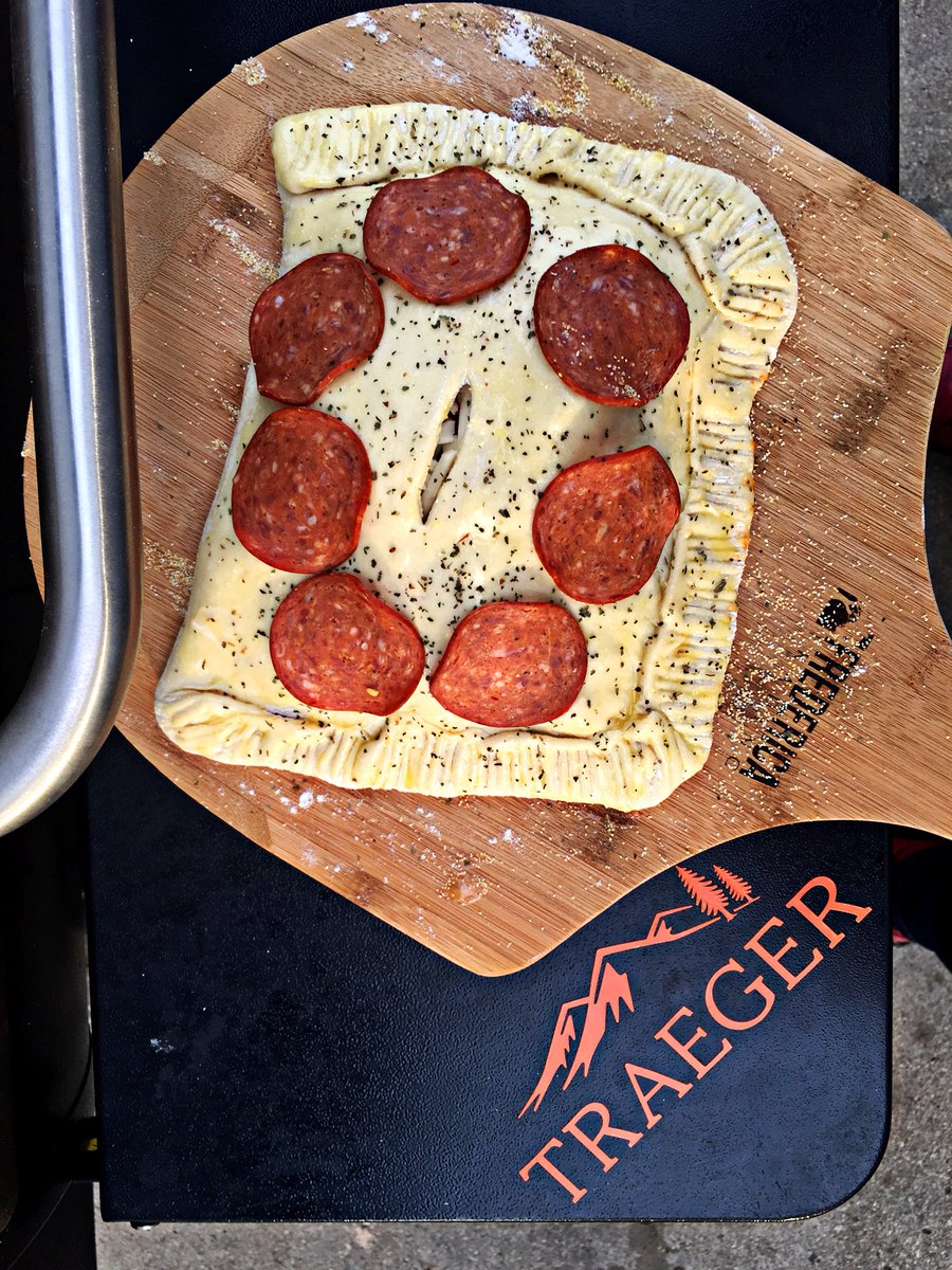 Triple6Grill's tweet photo. These did NOT suck! Man @TraegerGrills can do it all! These from scratch Calzones were to die for! Seasoned em up with some @MeatChurch Honey Bacon BBq rub 🔥🔥 #traegergrills #traegerbbq #traegerarmy #traegergameday #meatchurchprophets https://t.co/BiujOfXFXh