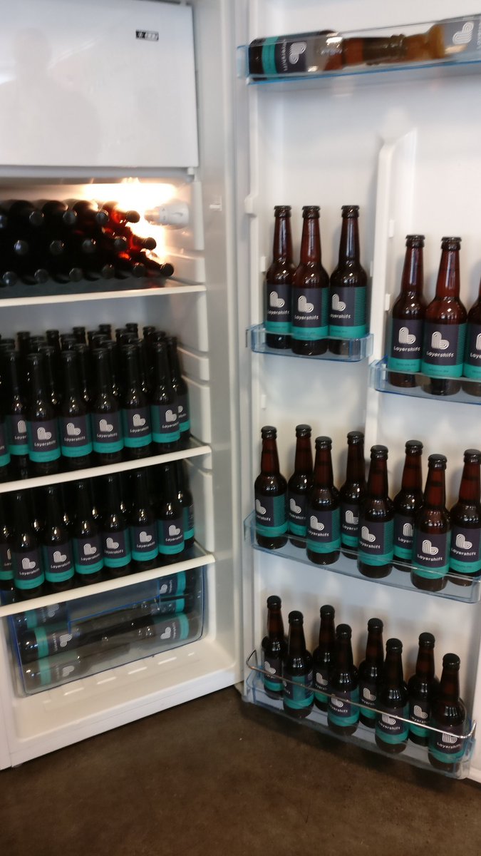 Layershift's tweet photo. Bottled #Layershift is served! Come get yours from the fridge @BarCampMCR #BCMCR8 https://t.co/EBSXOklAvu