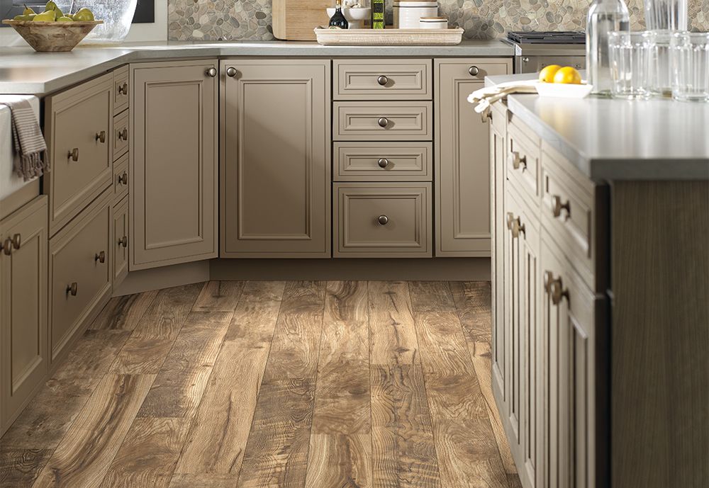 This gorgeous laminate from #ShawFloors features Repel water-resistant technology. And if that wasn't enough, it's scratch, stain, and fade-resistant. So bring it on! pbxx.it/Wp0qdB