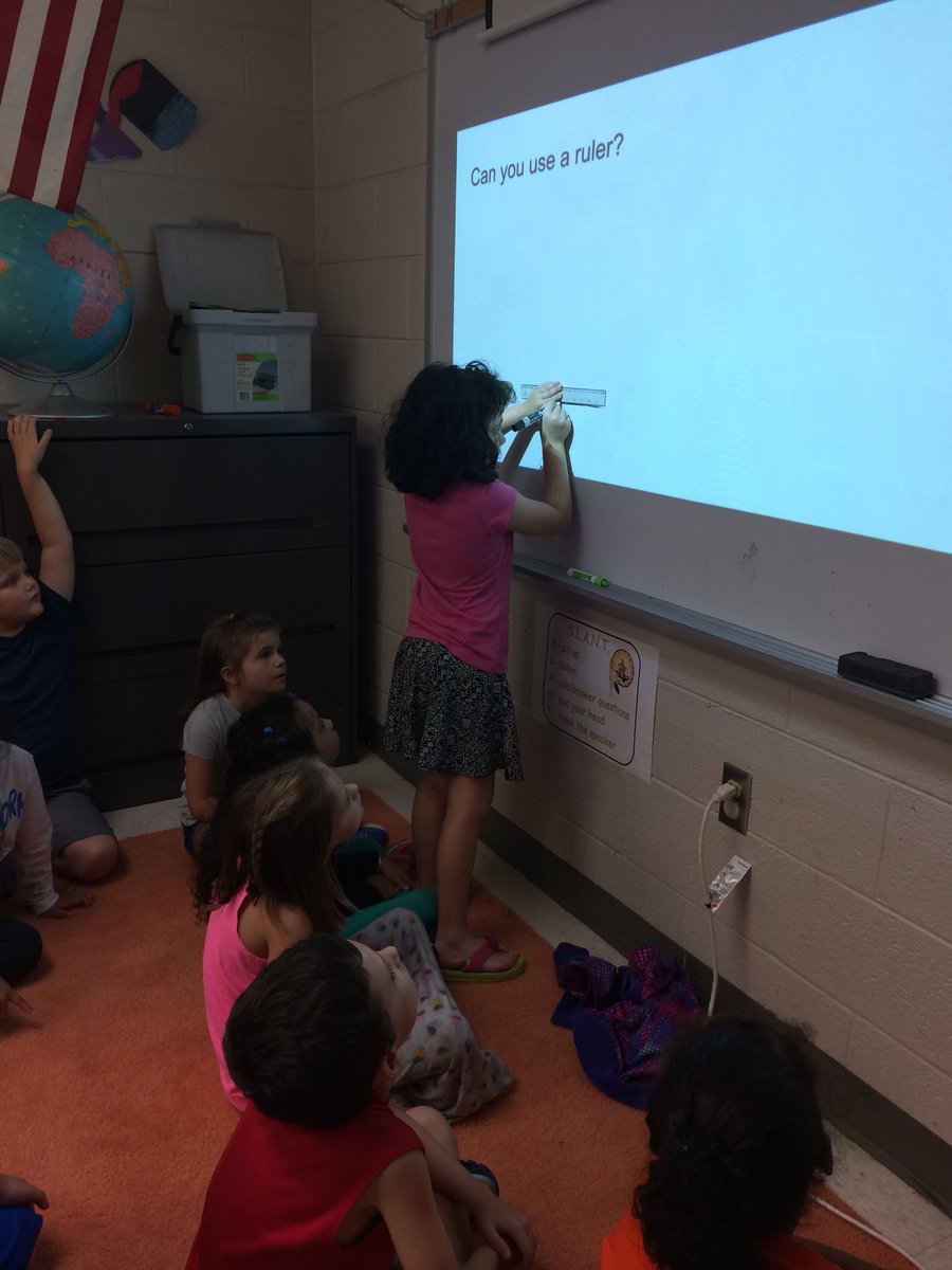 First graders showing the rest of their class how to use a ruler! Great job! #pocaprek5 #art #teacher