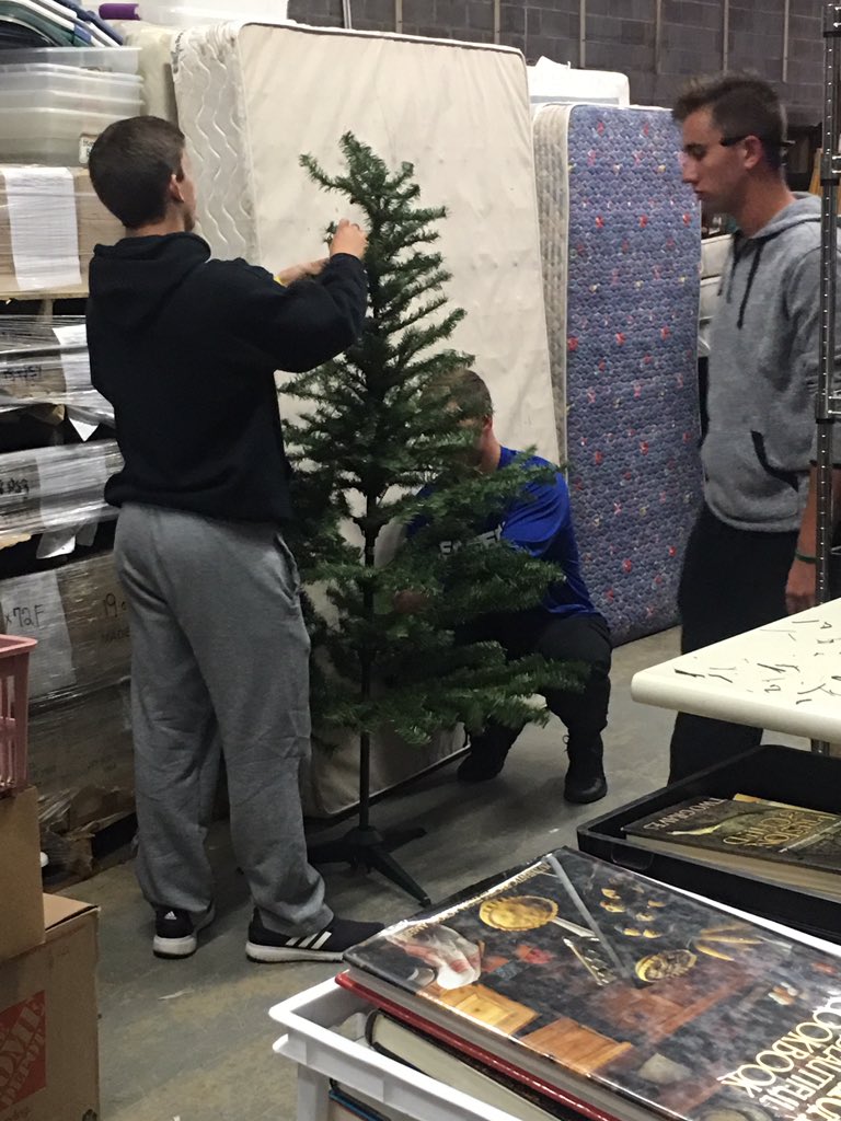 EIU_Baseball's tweet photo. Habitat Day at Habitat ReStore! EIU Baseball had a lot of fun helping out anyway they could. #Habitat #community #smashingthings https://t.co/XRpPKES1MR