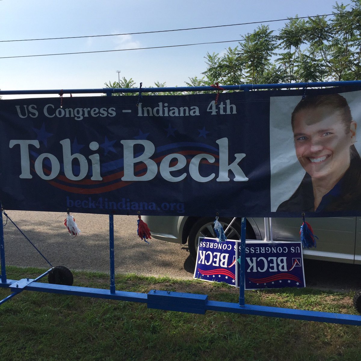 BeckForIndiana's tweet photo. Nothing like seeing a six foot high picture of your own face! #ParadeSeason #BackBeck https://t.co/NKWMCLBUnW