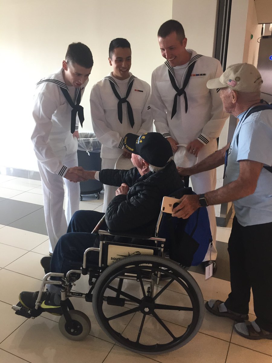 HonorFlightHou's tweet photo. Sailors sending us off at DCA! Remember to be at Hobby Airport at 7pm to welcome them home! #honorflight #honorflighthouston #Navy #WWIIVeteran #DCA #thankyouforyourservice #welcomehome https://t.co/2uqU0SjfNH