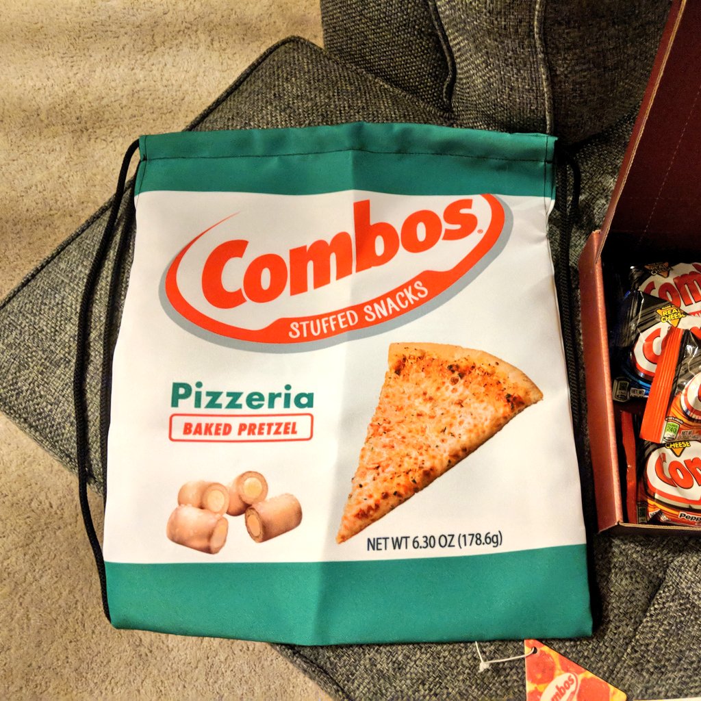 90sCraig's tweet photo. I got this really cool Swag Suitcase from @Combos. None of that generic crap here! I'm going to put a handle on it and use it as a briefcase. #CombosNation https://t.co/IvkTMGuSbZ