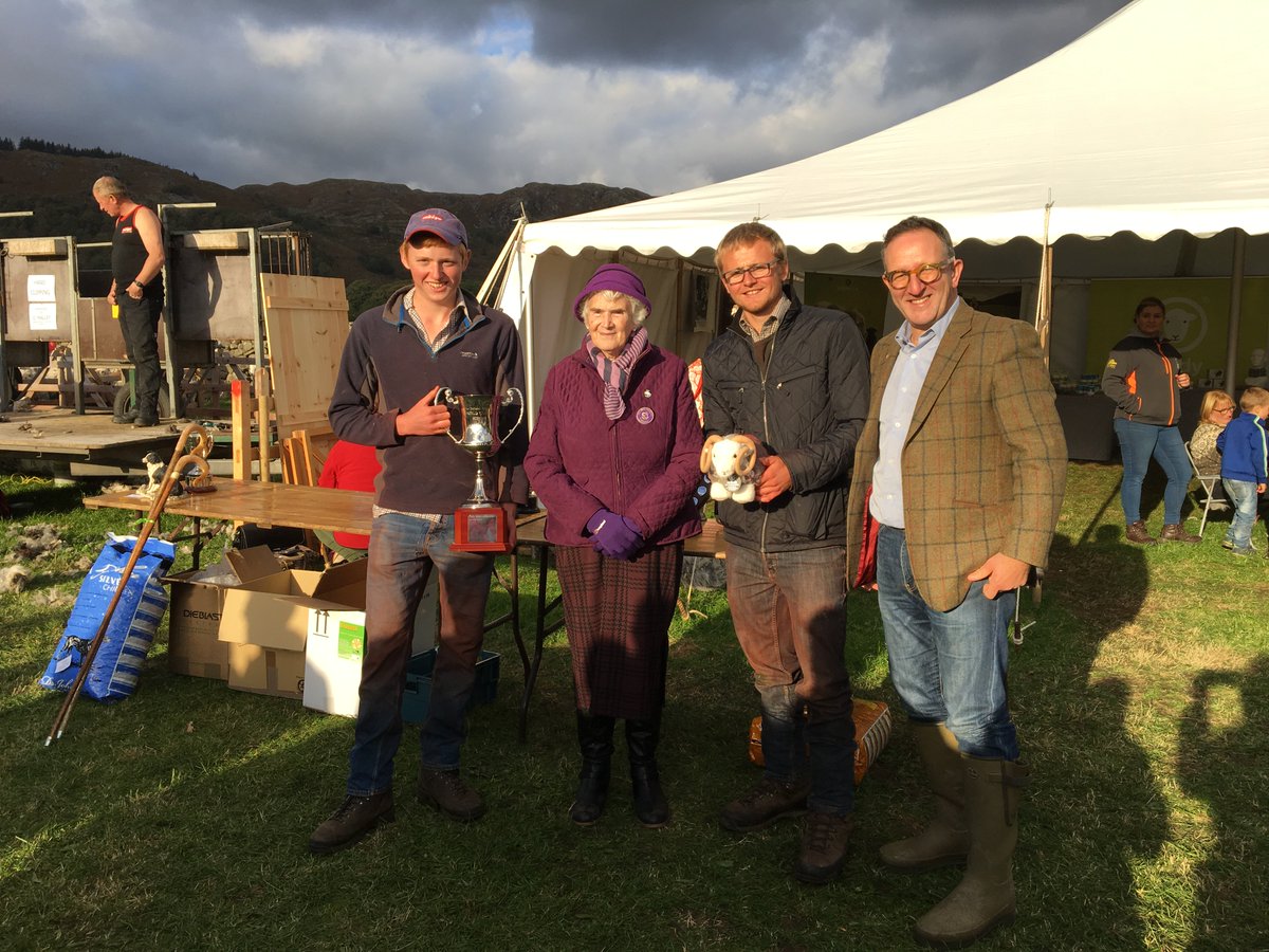 Jack and Alex Bland receiving their trophy from President Marion Harrison and special prize of a <a href="/HerdyUK/">Herdy</a> Tup from Spencer Hannah