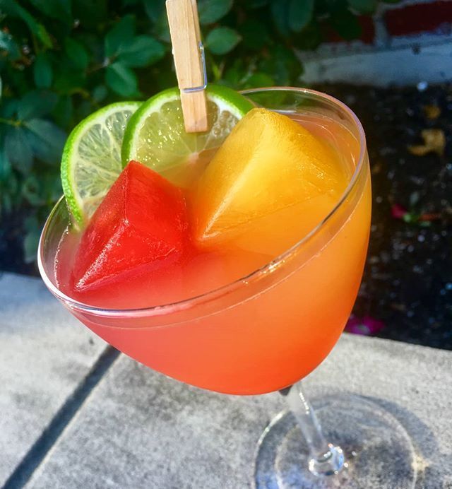 Tequila, Lime, Honey Syrup, Orange Bitters with Orange and cranberry juice ice cubes #cocktails #andover spirop.us/2P0DGVi