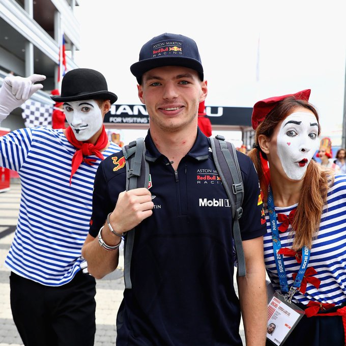 Max arriving at the track with two mime artists.