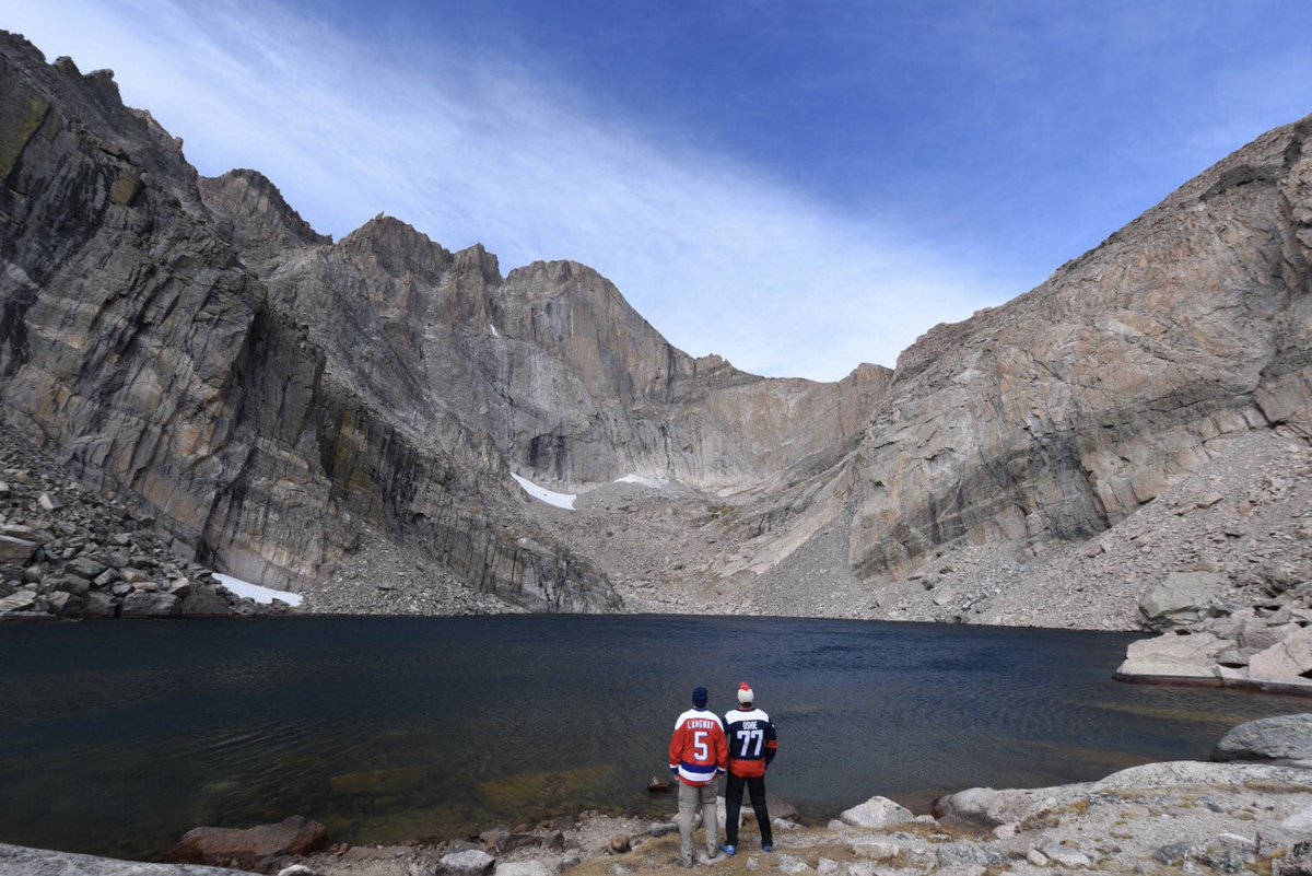 MikeEasby's tweet photo. Rocking the red at 11,760 feet. The peak we are looking at towers 2,495 feet above us. (For comparison, One World Trade Center is 1,776 feet tall). This view is just massive. Humbling and inspiring. Perfect place to rep the @Capitals #champs #chasmlake #rmnp https://t.co/MmnTa0fGdO