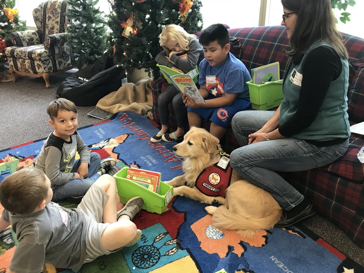 JWalrath2's tweet photo. Can’t think of a better way to spend a Friday afternoon.  2nd graders reading to dogs training to be service dogs. ❤️ #teachmorris @morris54braves https://t.co/9omRV3pQ0I