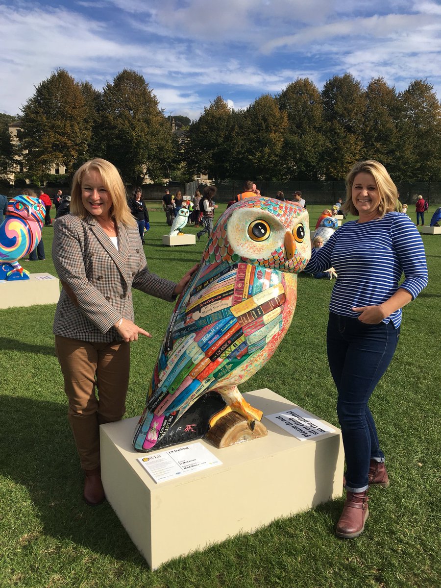 Girlcopnovel's tweet photo. Great afternoon at the @OwlsofBath Farewell! Here I am with JK Owling’s artist @jomccarron with her masterpiece featuring my own Girl Cop novel alongside Jane Austen #honoured https://t.co/CbBi8weQod