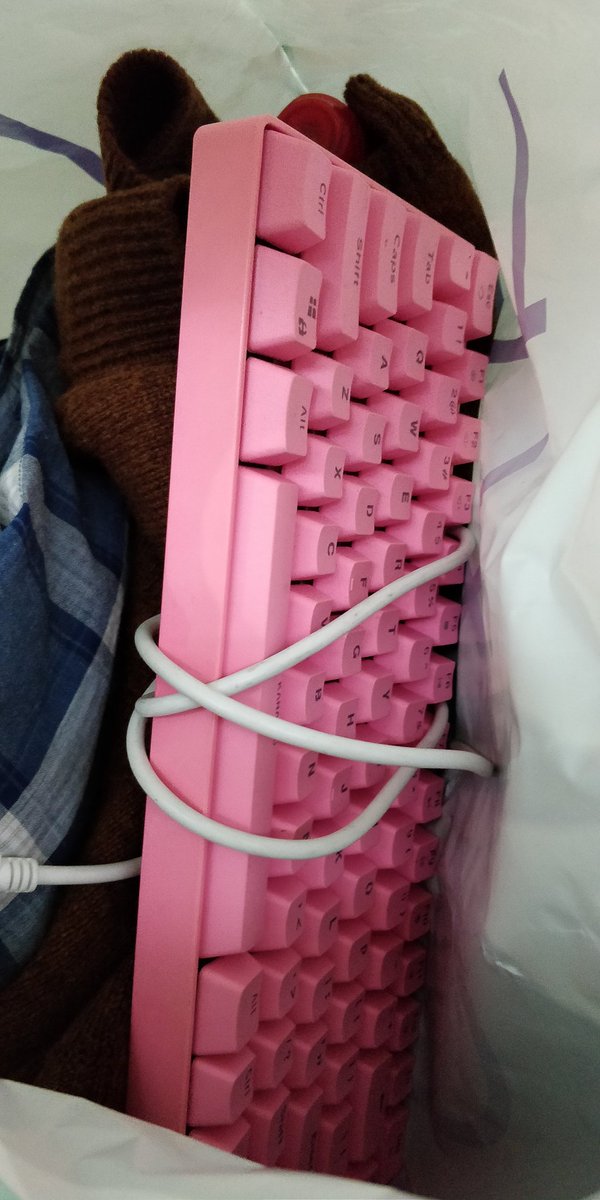 ThisIsTomPlatt's tweet photo. So I bought a bright pink keyboard from a homeless man this morning... https://t.co/DfG7yPcKL2