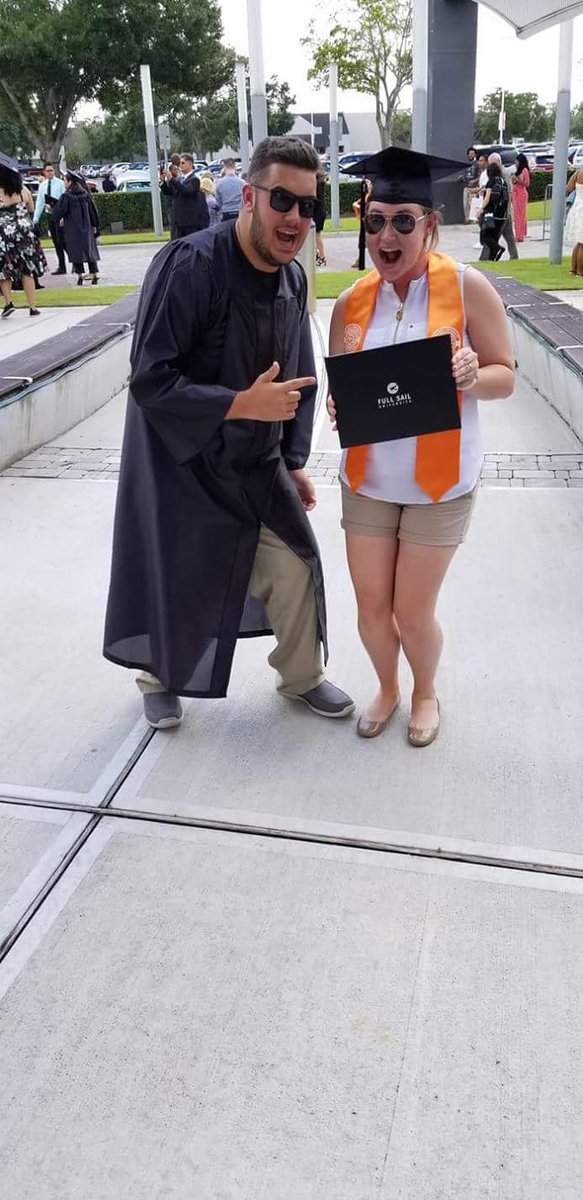 Chrispysoraus's tweet photo. What do you do when your graduate college? You get a bomb ass photo with your loving sister #FullSailGraduate https://t.co/4apjA4SHCF