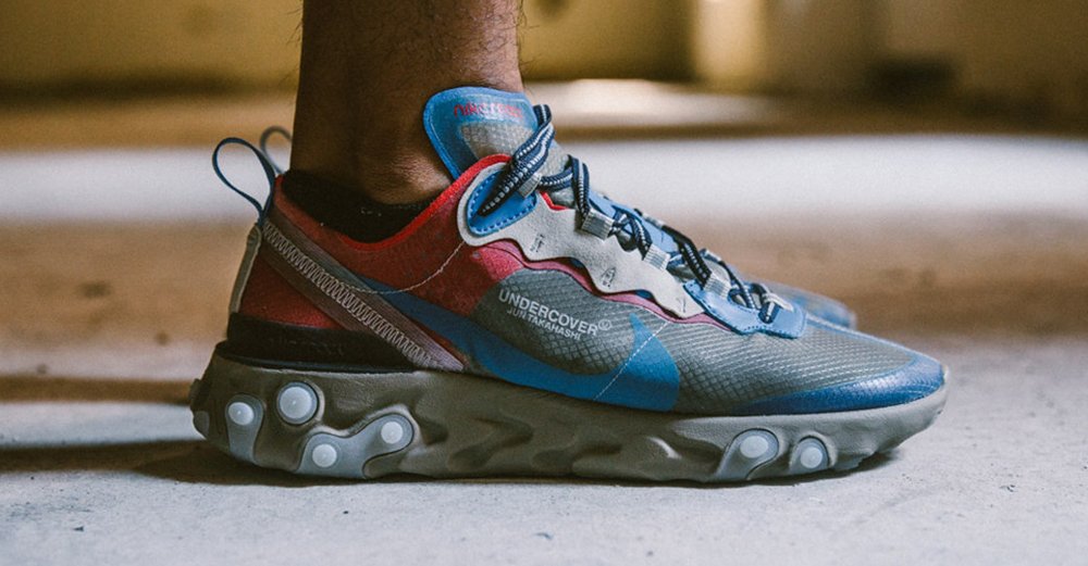 nike react element 87 blue chill solar red on feet