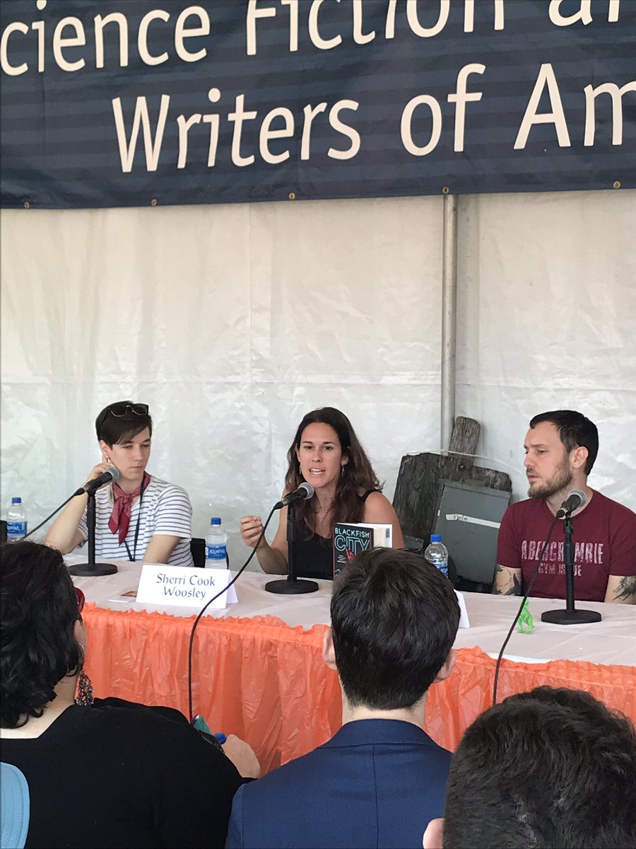 CChrisrose's tweet photo. Sherri Woosley making a point in the Cities panel at the @sfwa tent, with @larazontally and @sentencebender 
#BaltimoreBookFest 2018 https://t.co/LFTFNsjwFR