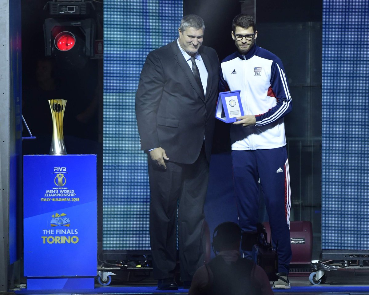 Matt Anderson shows his award