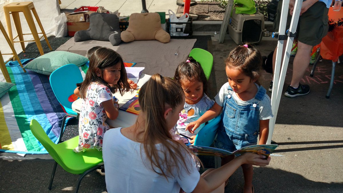 Hull_lot2learn's tweet photo. @nhs_njhs Check this out! #helixnhs students from #helixcharter helped kids put the apps down and pick some books up. 'Read with a Scottie' booth was a tremendous success!!! We estimate 1,000 books given to children at Oktoberfest!!! We even got to read WITH and be ready TO https://t.co/YESrqLR3eh