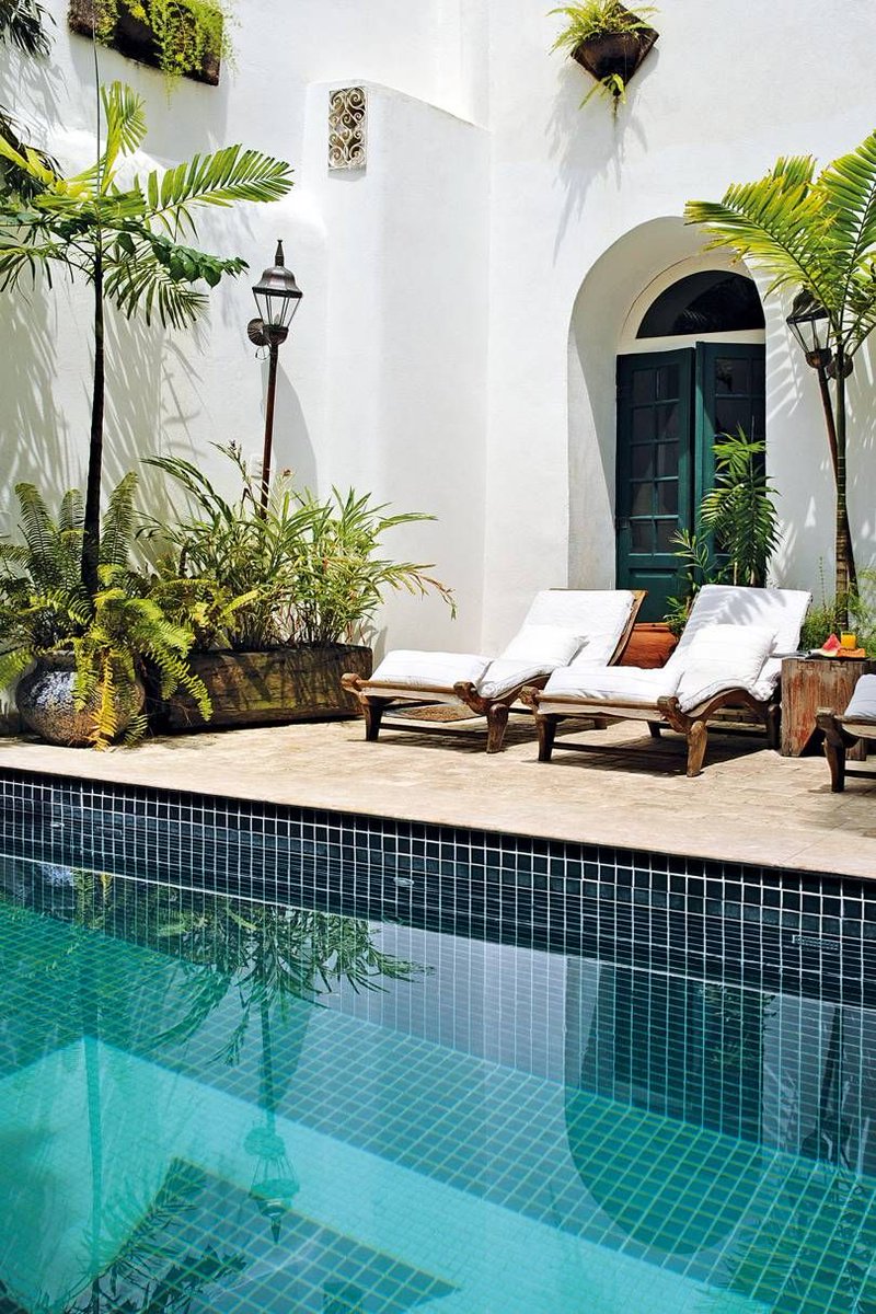 cntraveller's tweet image. In the Pelourinho district of Salvador is Villa Bahia, a large colonial-style ‘pousada’ with a tiny courtyard and a pool surrounded by plants, the coolest place to be in the neighbourhood come evening. #MondayBlues #pooloftheweek #Brazil