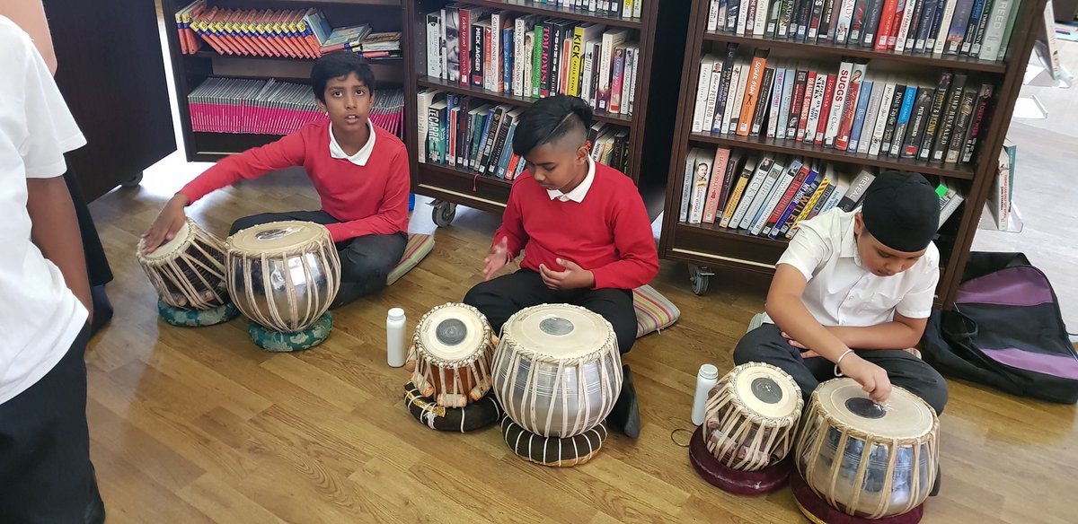 Goodall_Miss's tweet photo. A massive well done to the Year 5/6 Singing Group and the Tabla Group for performing at Thimblemill Library this afternoon as part of National Libraries Week. @UplandsManor #nationallibrariesweek #thimblemilllibrary https://t.co/Se6oMZIBUg