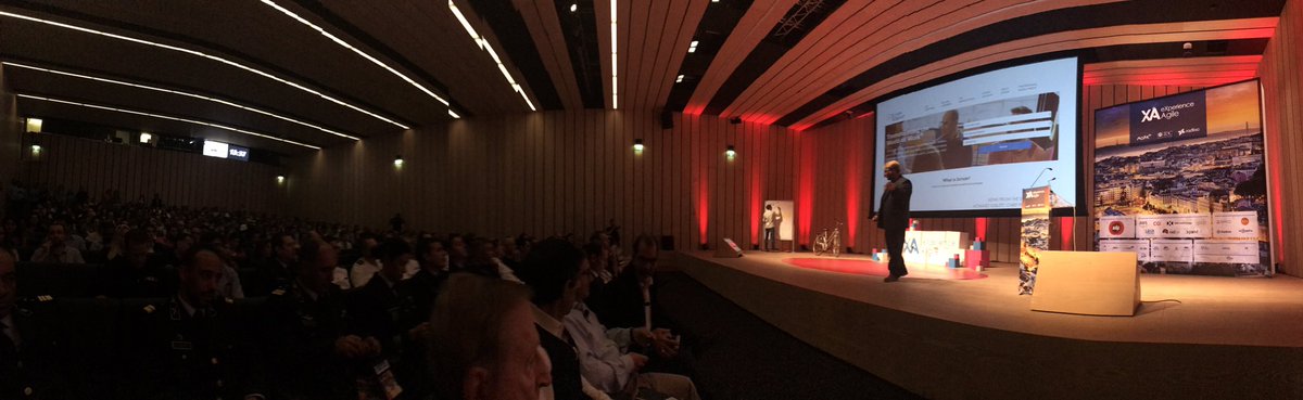 MariaMatarelli's tweet image. As the #eXperienceAgile Global event kicks off @howardsublett #ChiefProductOwner of @ScrumAlliance talks about the benefits of #Organizational #Agility #RealResults #SpeedToMarket #Innovation #Employee #Morale #XA2018 #Lisbon #Portugal