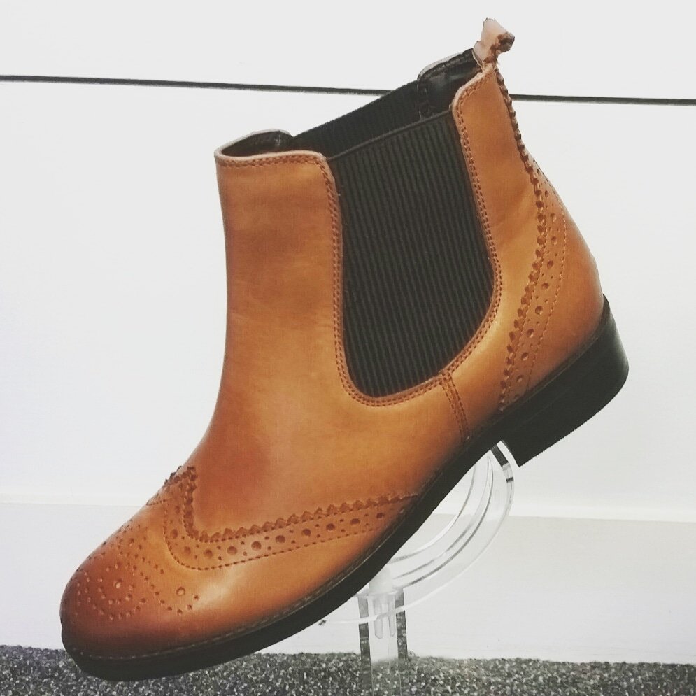 These stylish ladies' Chelsea boots feature a brogue design and decoration,  smooth leather uppers and elasticated twin gusset. 
#chelseaboots #ladiesfootwear #ladiesboots #ladiesfashion #leatherboots #brogueboots