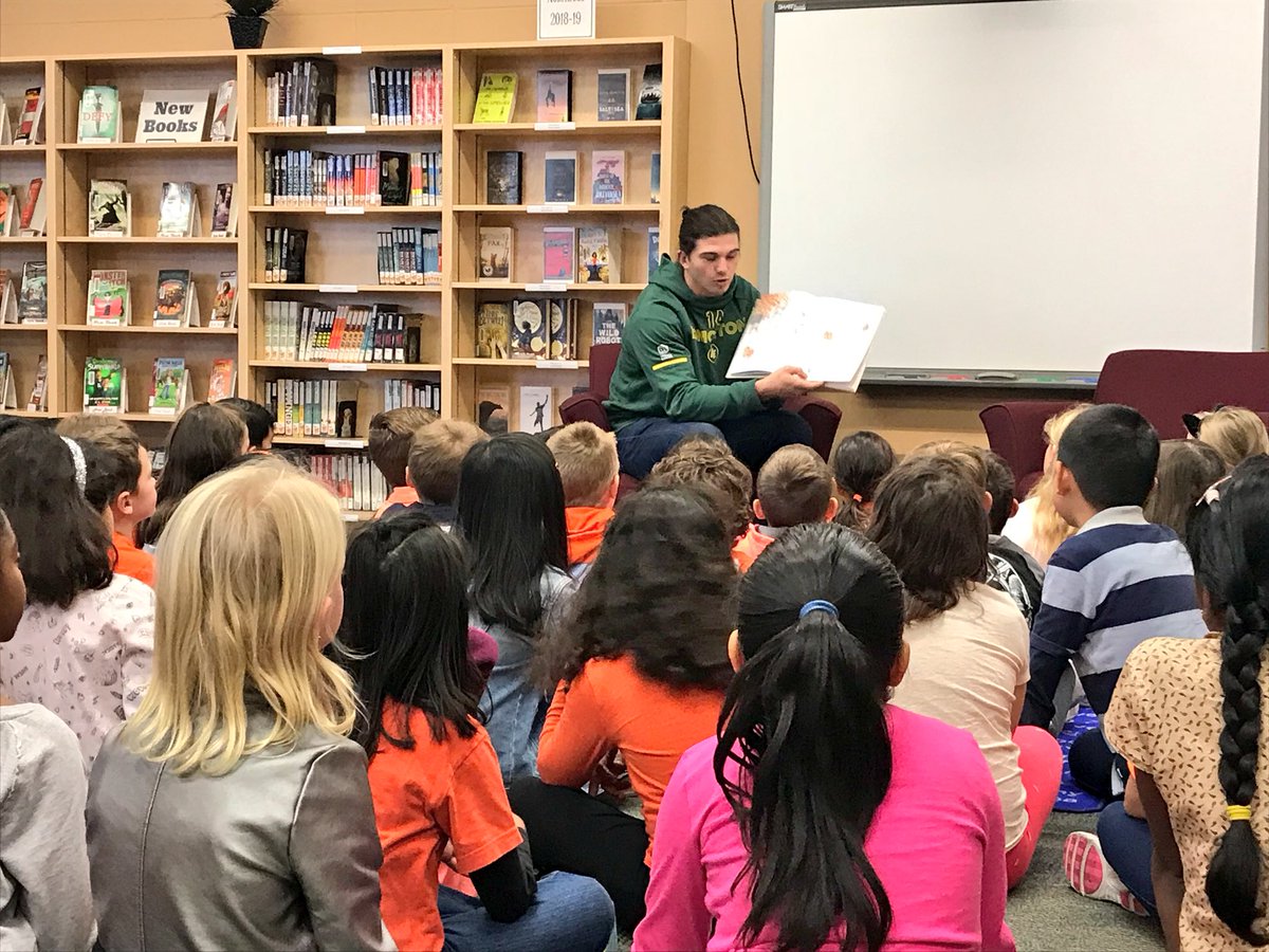 GoElks's tweet photo. We are out in the community for read-in week! We’ll be out visiting schools throughout the week. @zachklineQB stopped by a couple schools named after Esks legends, Don Getty and Johnny Bright! https://t.co/t4PSvH2t64