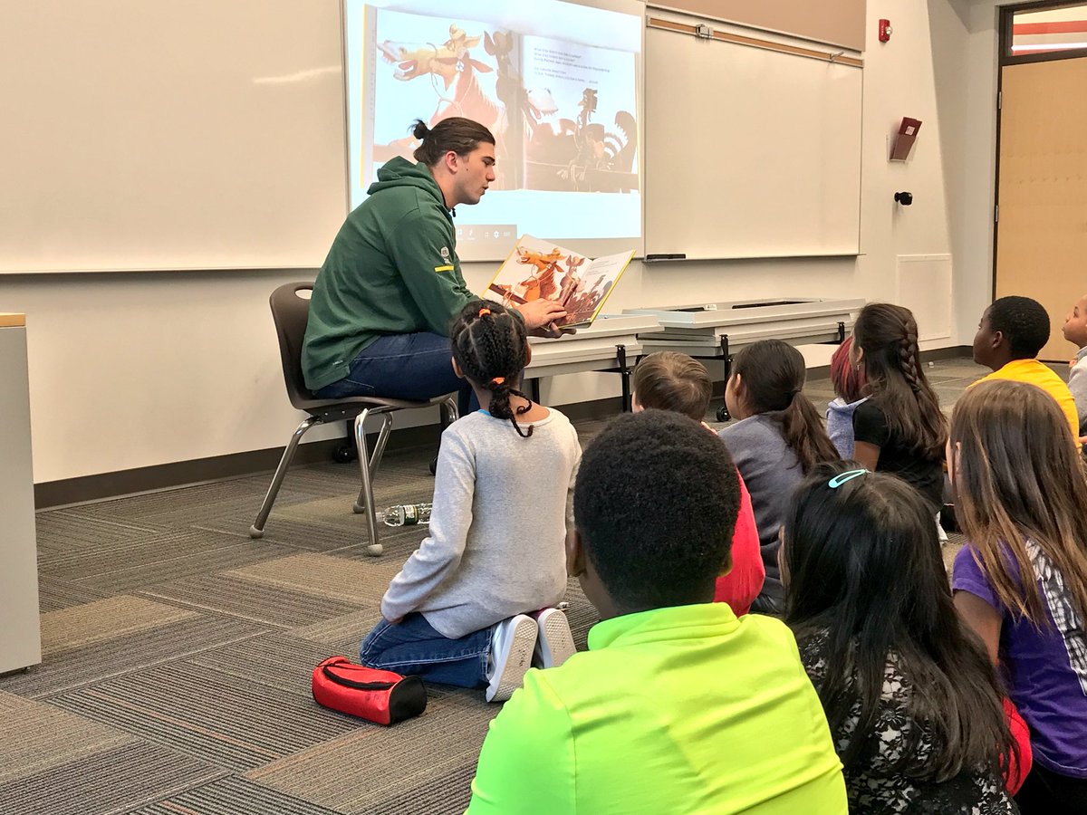 GoElks's tweet photo. We are out in the community for read-in week! We’ll be out visiting schools throughout the week. @zachklineQB stopped by a couple schools named after Esks legends, Don Getty and Johnny Bright! https://t.co/t4PSvH2t64