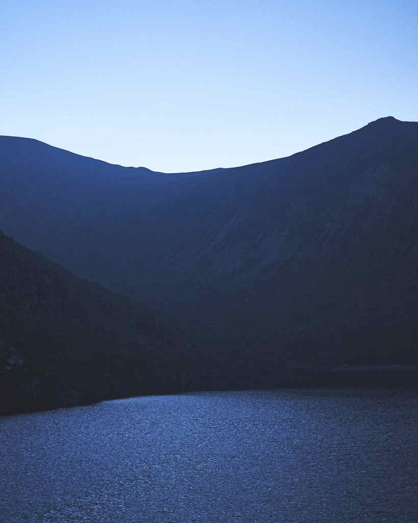 Lake at the base of Carnedd Llewelyn, Snowdonia. Shot handheld on a nighthike at 12:00am