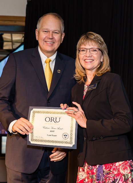 ORULibrary's tweet photo. The ORU Library's Lynn Harger was awarded last week the 2018 @OralRobertsU Customer Service Award for her outstanding service to ORU students, faculty and staff. Congratulations Lynn on this well deserved honor! https://t.co/lOPTdxgvJP