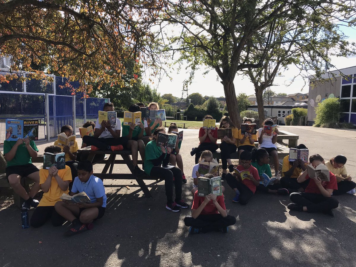 EduMissM's tweet photo. #WalnutClassLHS are making the most of the October sunshine and their new #reading books from the library! #readingLHS #Year6LHS @HeadLHS https://t.co/SKymAZUaFG