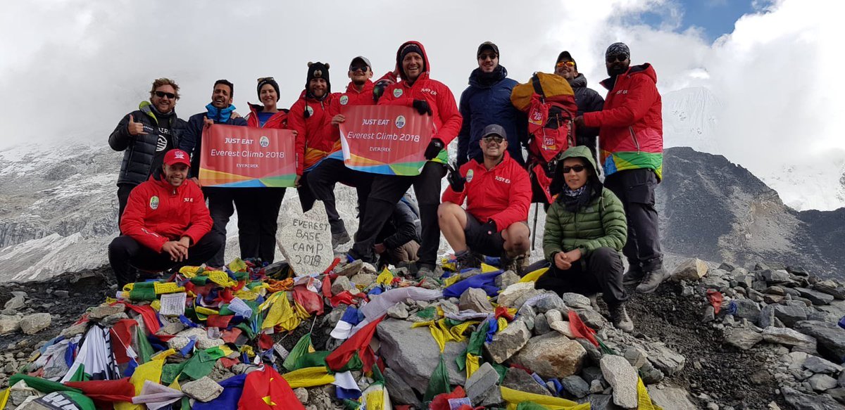 JustEatTakeaway's tweet photo. They made it! We're delighted that after a gruelling few days, our amazing 11 Just Eaters have reached #EverestBaseCamp in aid of @foodcycle. Well done guys, we're super proud.  Read more and donate here: https://t.co/l3mAtUpPa0     🏔️💚😃 https://t.co/hRynDtj23m