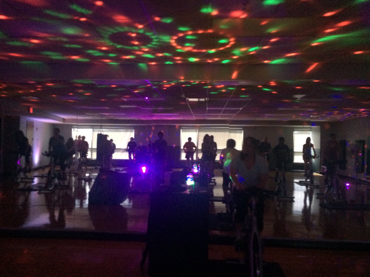 dduffy_ksu's tweet photo. Everyone's favorite Group X instructor, Beth Michel, has been making Free Fridays at the @srwc even more fun with glow spin! Interested in joining the fun? Visit https://t.co/lgKffROnuv to find and register for spin 50/50 and other wellness offerings! #ShowUsYourMove #HealthyKSU https://t.co/VCttqhnwvR